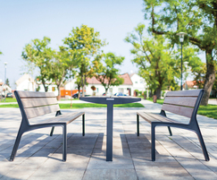 Vera Solo park table shown with benches