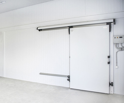 Automated sliding refrigeration door