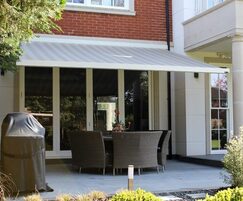 Retractable patio awning for residential use