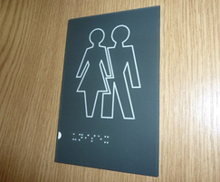 Tactile toilet door sign with Braille