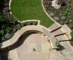 Slabby sandstone paving  shown with setts