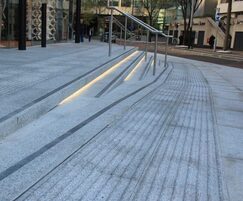 Special corduroy tactile paving above and below steps