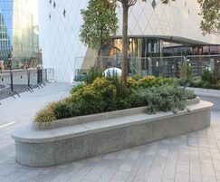 Granite cladding and coping for bench planter feature