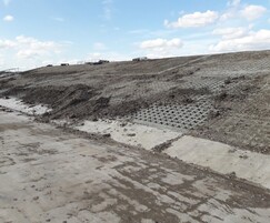 Topsoil from the site scrape used to fill Grasscrete.