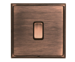 Rocker switch in copper bronze finish