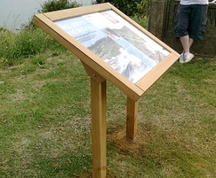 Timber lectern display on river bank
