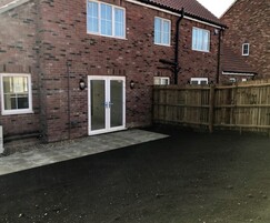 Topsoil laid at new build home