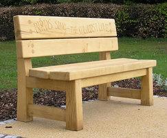 Green oak double-back bench with hand-carved lettering